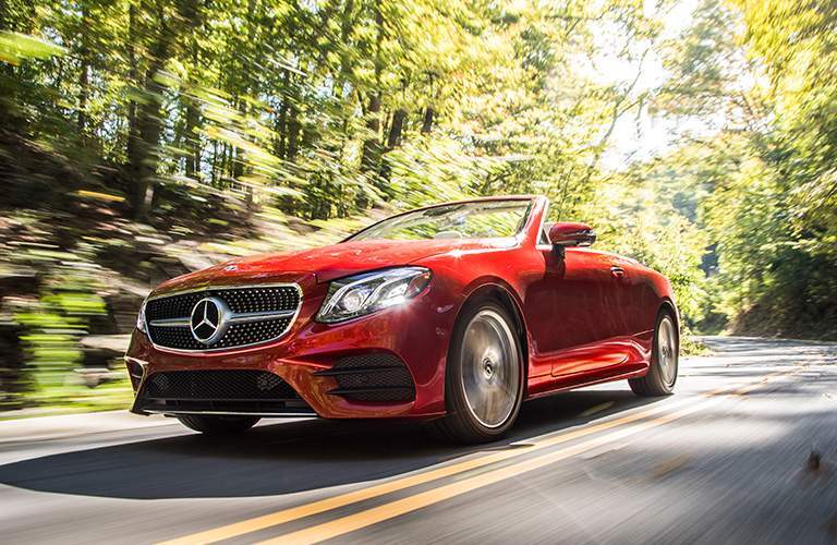 close up on the 2018 Mercedes-Benz E-Class Cabriolet in red on the road