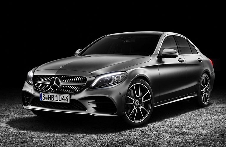 front end of 2019 c-class sedan on black background