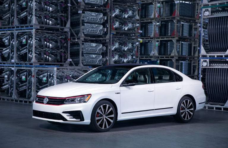 A left front quarter view of the 2018 VW Passat GT in a factory setting