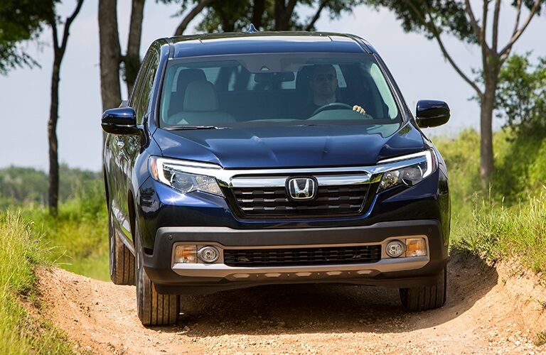 2019 Honda Ridgeline Vs 2018 Front View Of A 2019 Honda Ridgeline Driving Off Road