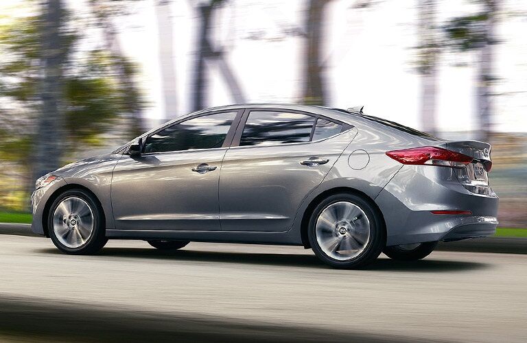 Silver 2017 Hyundai Elantra driving on road