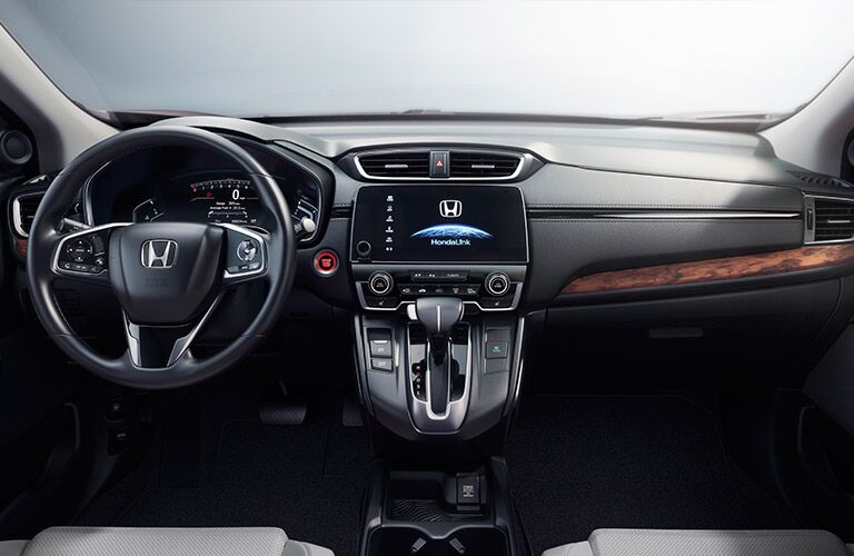 steering wheel and dashboard view of the 2017 Honda CR-V