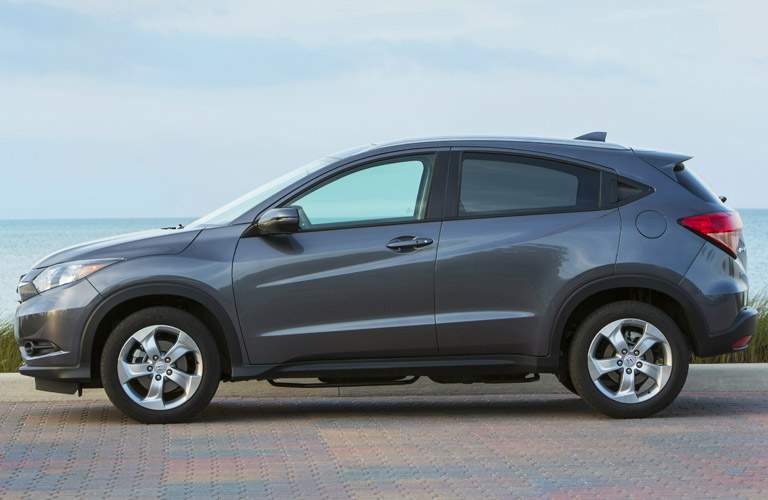 Side view of the 2017 Honda HR-V parked in front of a body of water