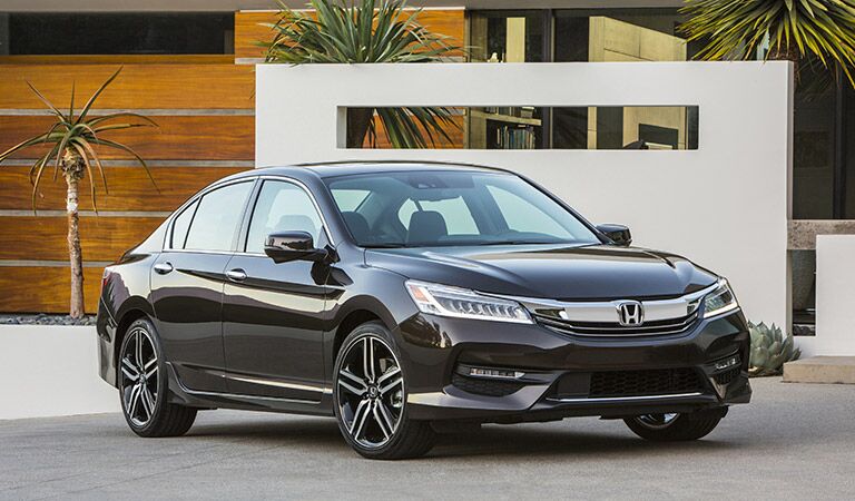 2017 Honda Accord parked in front of a home