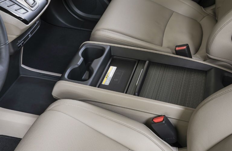 2019 Honda Odyssey interior front cabin close up of center console and partial seats