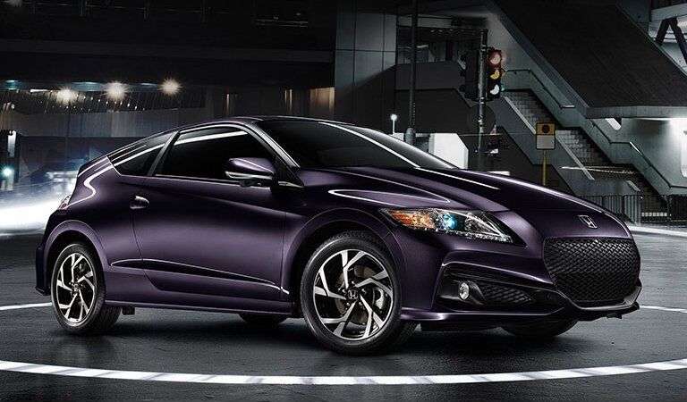 purple 2016 Honda CR-Z parked in a dark warehouse
