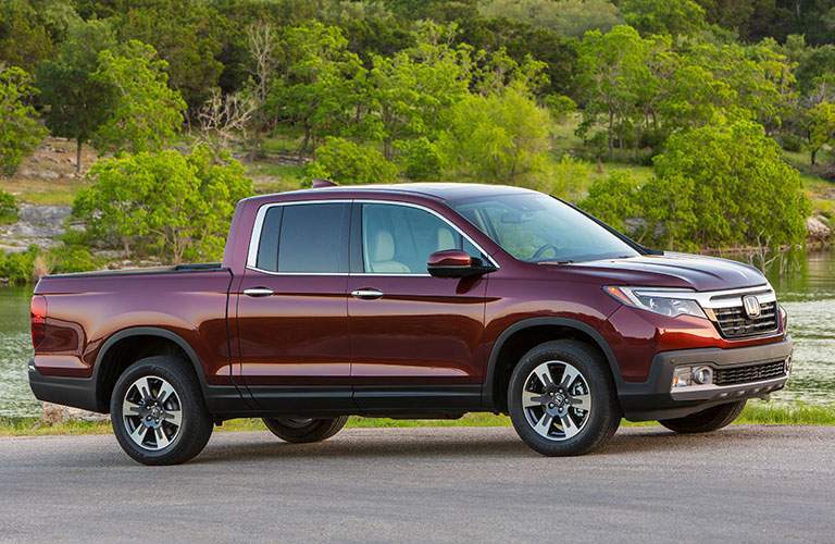 side view of a deep red 2018 Honda Ridgeline