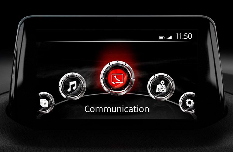 A close up photo of the infotainment touchscreen in the 2018 Mazda3.
