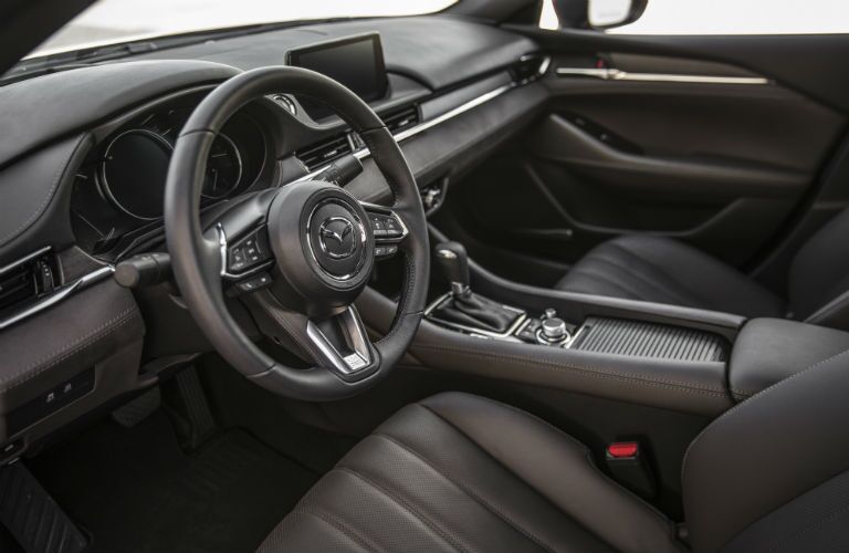 An interior photo of the front half of the 2018 Mazda6.