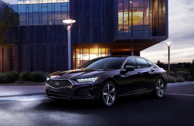 Front driver angle of a dark-colored 2021 Acura TLX