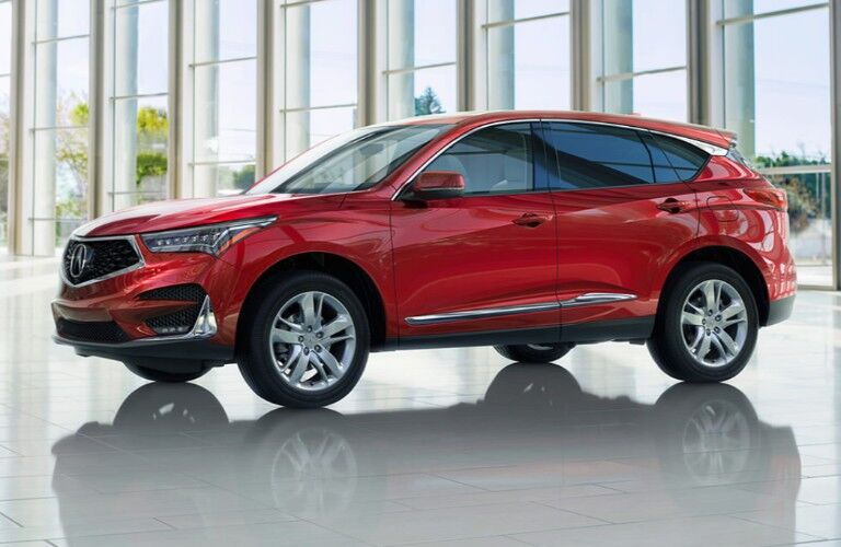 Front driver angle of a red 2020 Acura RDX