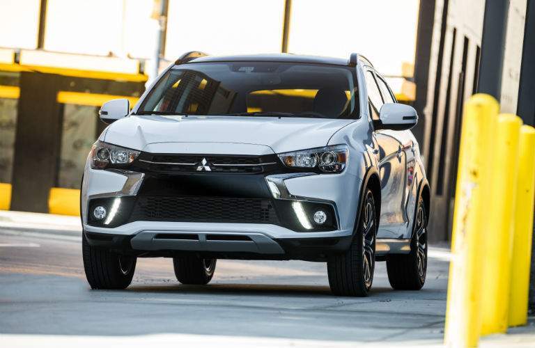 A head-on photo of the 2018 Mitsubishi Outlander Sport parked on the street.