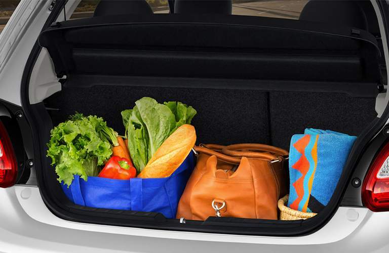 A photo of the rear of the 2018 Mitsubishi Mirage packed with groceries