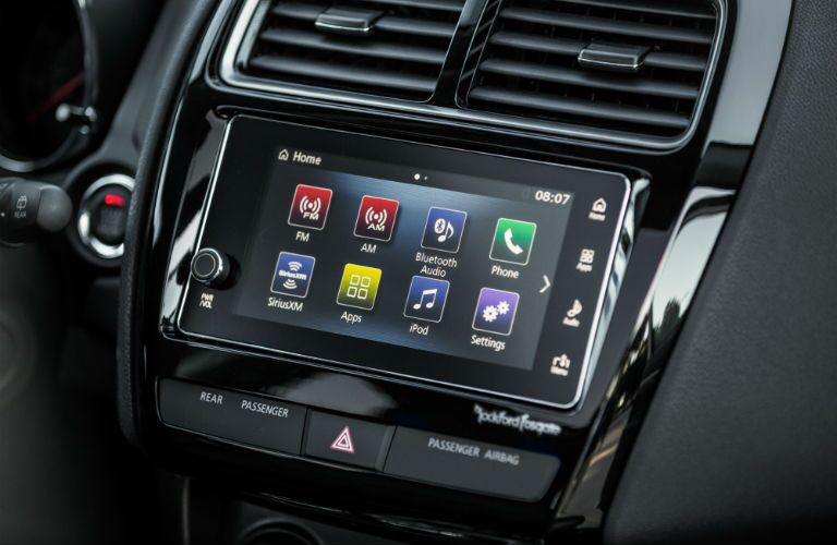 A close up photo of the touchscreen interface in the 2018 Outlander Sport.