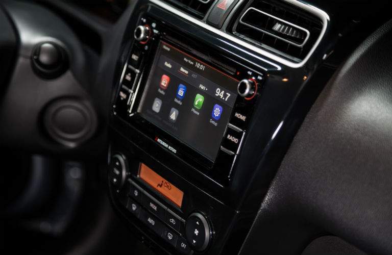 A close up photo of the infotainment system's touchscreen for the 2018 Mitsubishi Mirage G4
