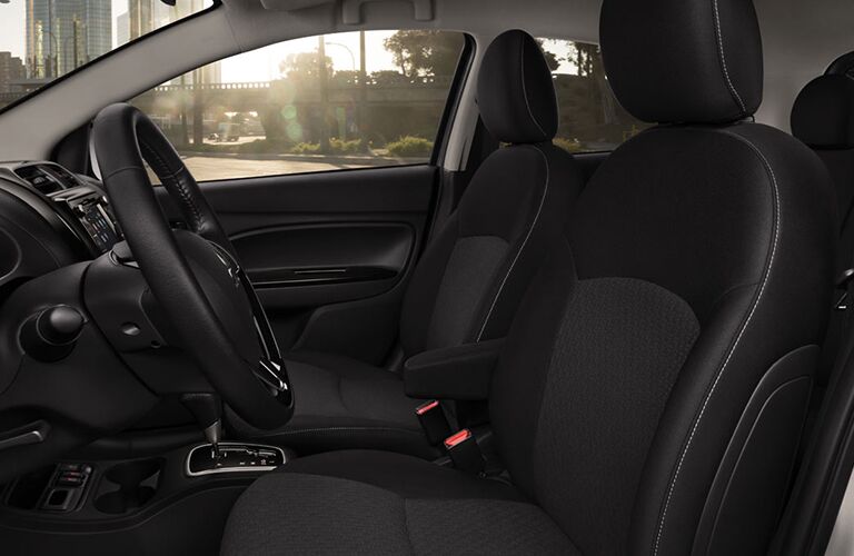 An interior photo of the driver and front passenger seat of the 2018 Mirage.