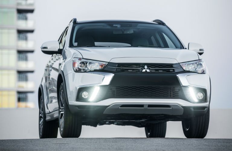 A head-on photo of the 2018 Mitsubishi Outlander Sport parked on a roof.