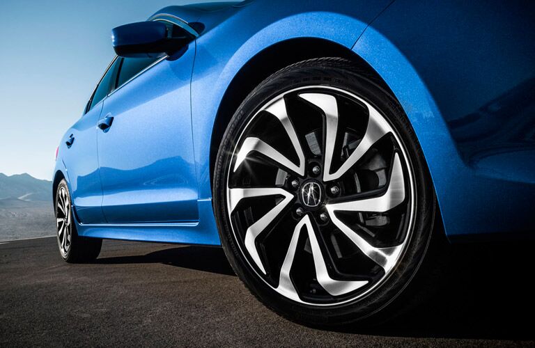 Close up of the 2017 Acura ILX's front wheel from the ground level looking up