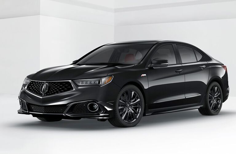 A front left quarter photo of a 2018 Acura TLX in a photo studio.