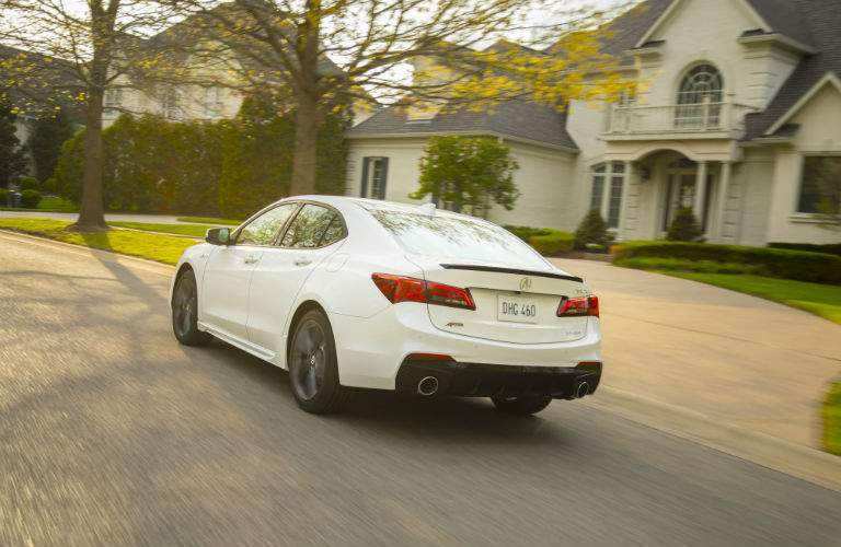 A rear left quarter view of the 2018 Acura TLX