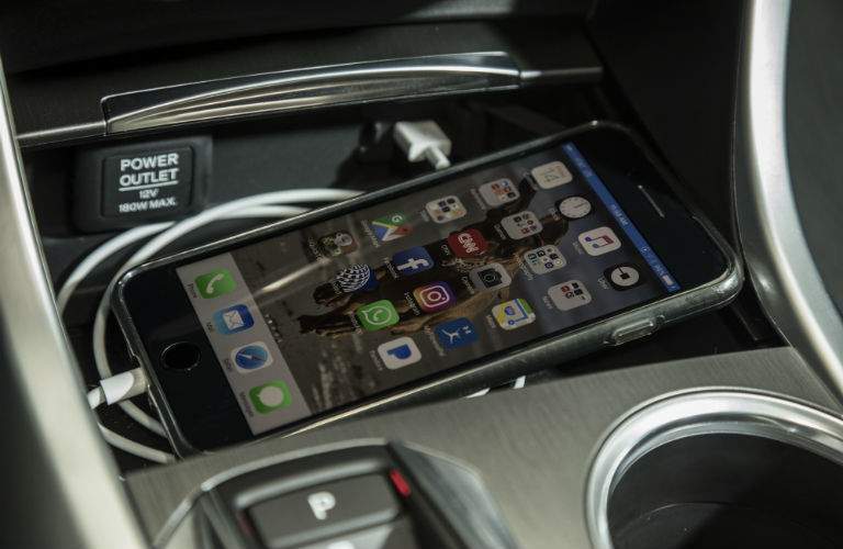 A close up photo of the wireless smartphone charging tray in the 2018 TLX