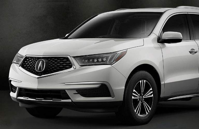 Front half of a white 2018 Acura MDX Standard