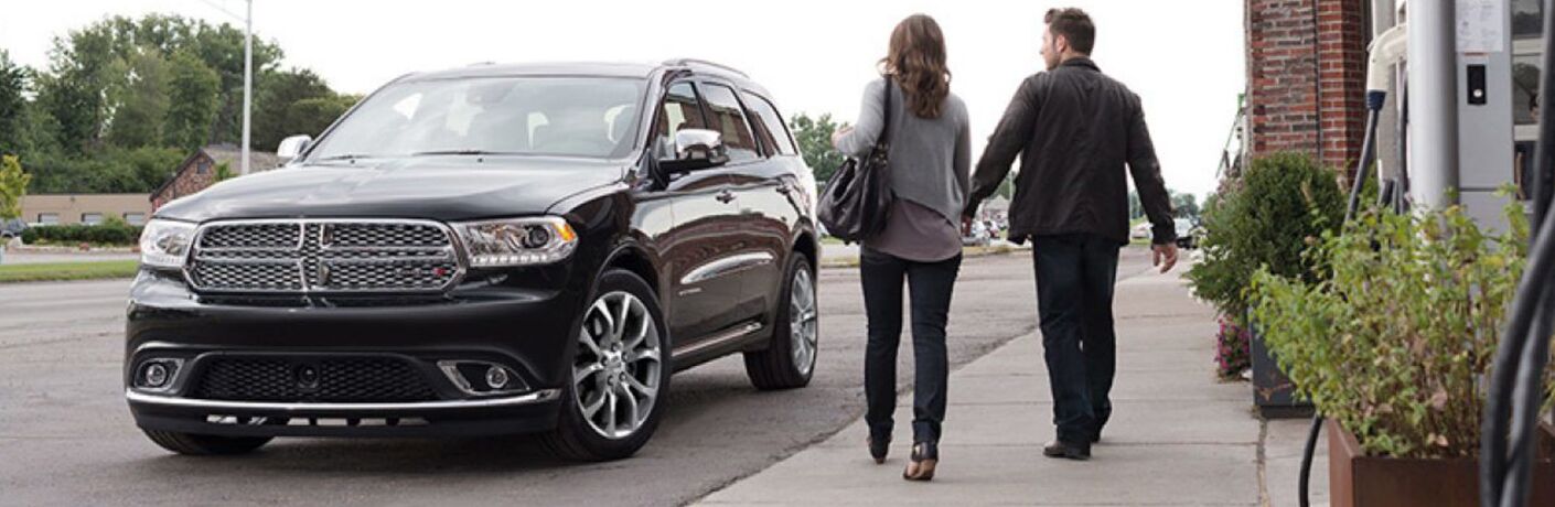 couple walking toward 2019 Dodge Durango