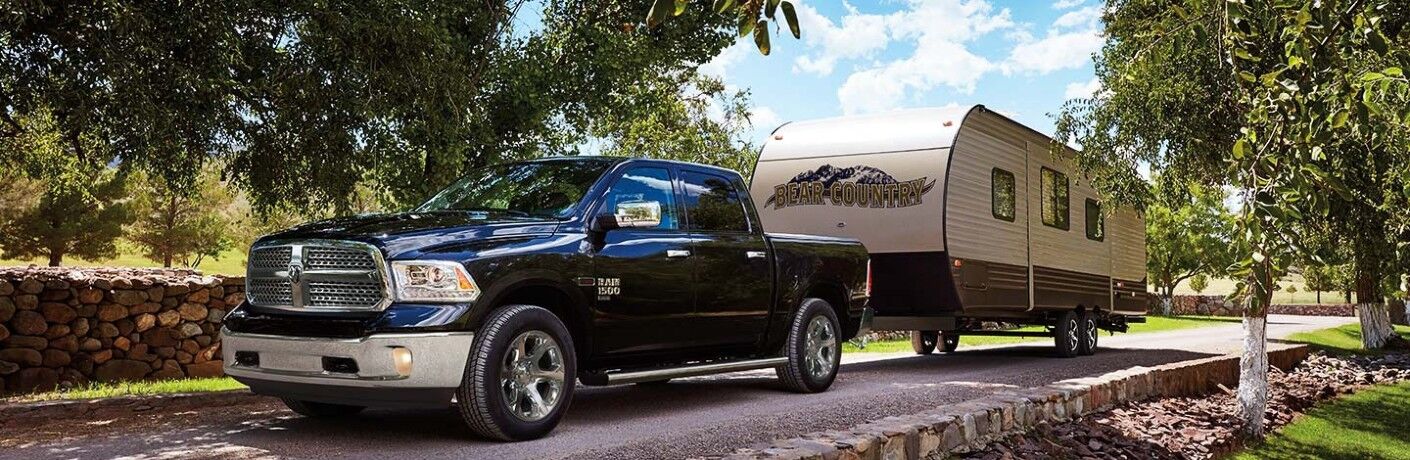 blue 2019 RAM 1500 Classic towing trailer