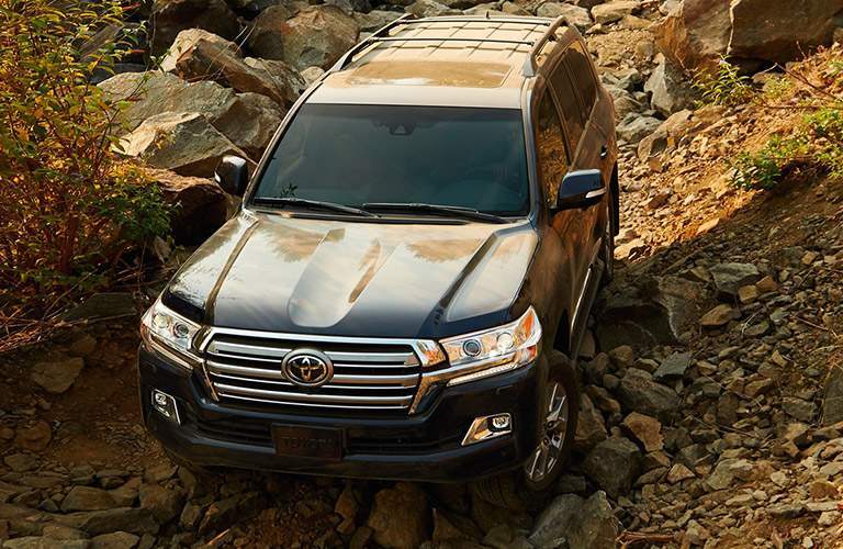 2018 Toyota Land Cruiser driving on rocks