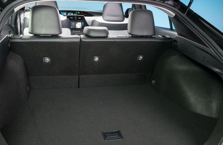 An interior photo of the primary rear seat configuration of the 2018 Prius.