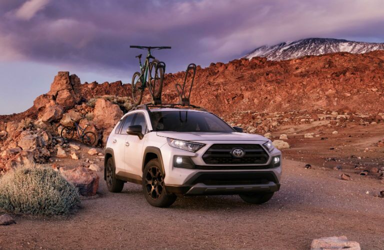 A photo of the 2020 Toyota RAV4 TRD Off-Road on a rocky trail.