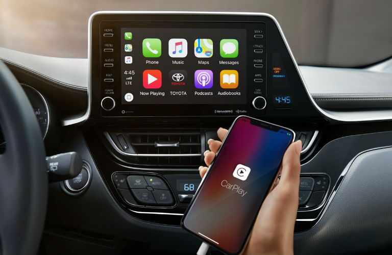 A photo of an iPhone attached to the infotainment system in the 2019 C-HR.
