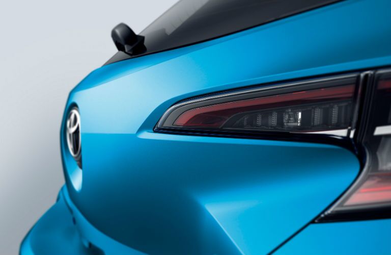A close up photo of the new taillight assemble and rear gate of the 2019 Corolla Hatchback.