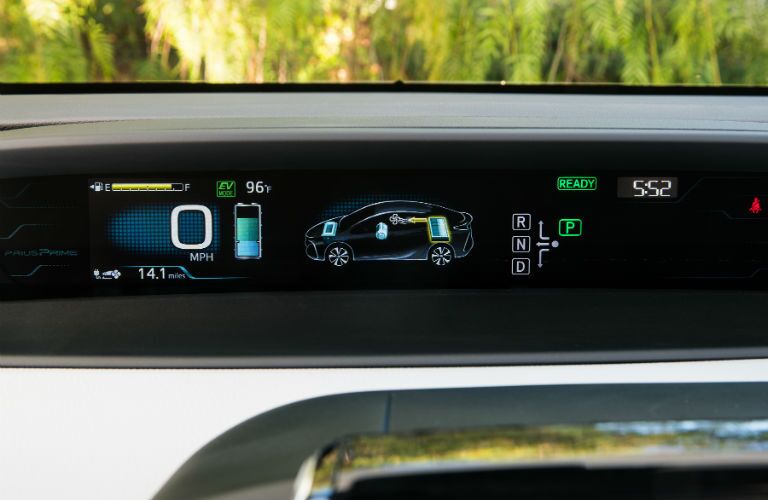 A close up photo of a display in the 2018 Toyota Prius Prime showing important EV information.