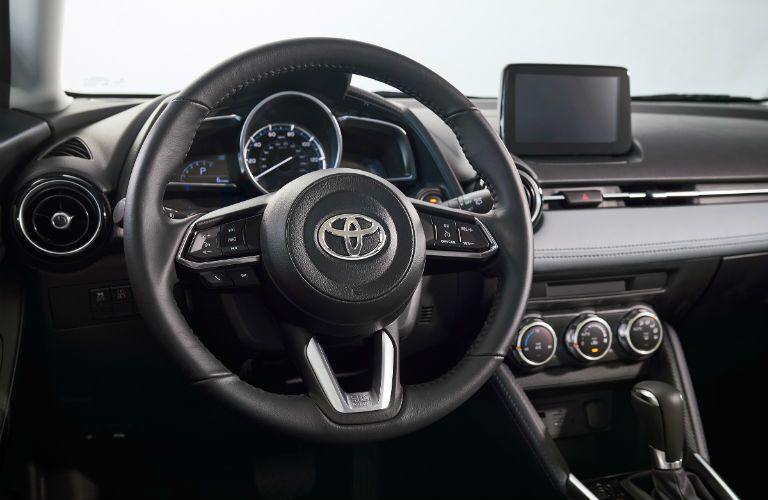 A photo of the driver's cockpit in the 2020 Toyota Yaris.