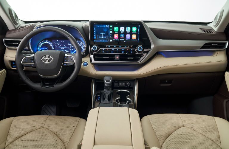 A photo of the touchscreen interface and center gauge cluster in the 2020 Highlander.