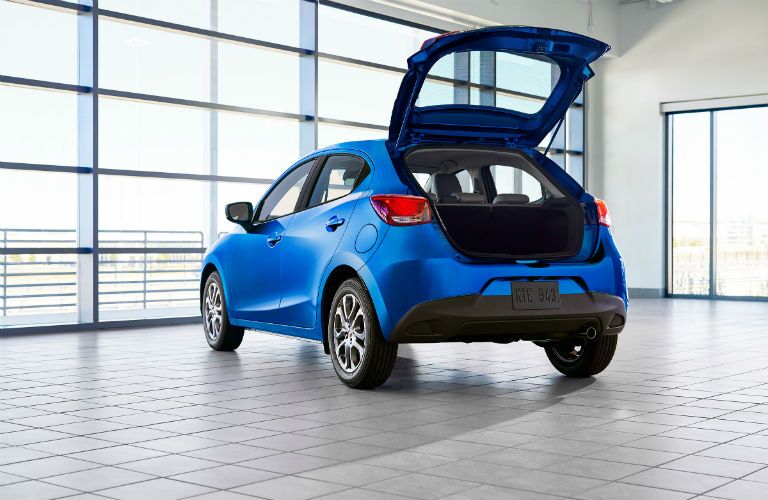 A rear photo of the 2020 Toyota Yaris with the rear hatch open.