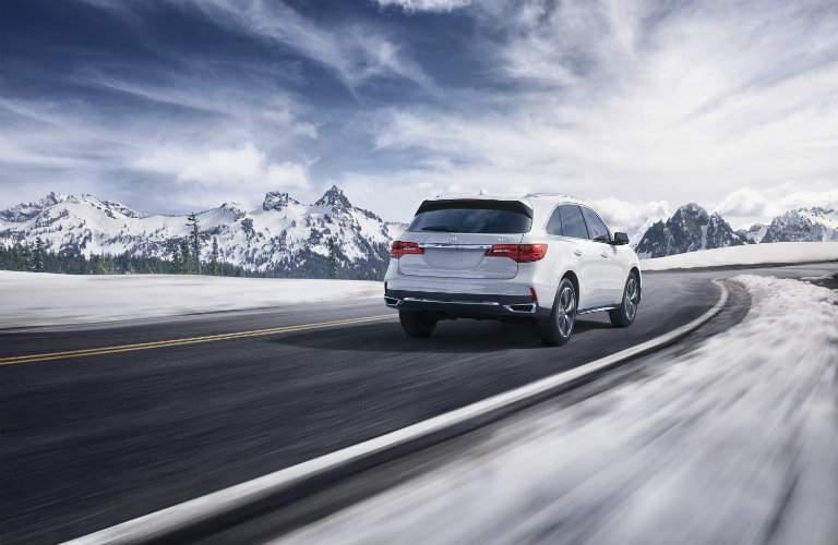 2018 Acura MDX Driving Towards Mountains