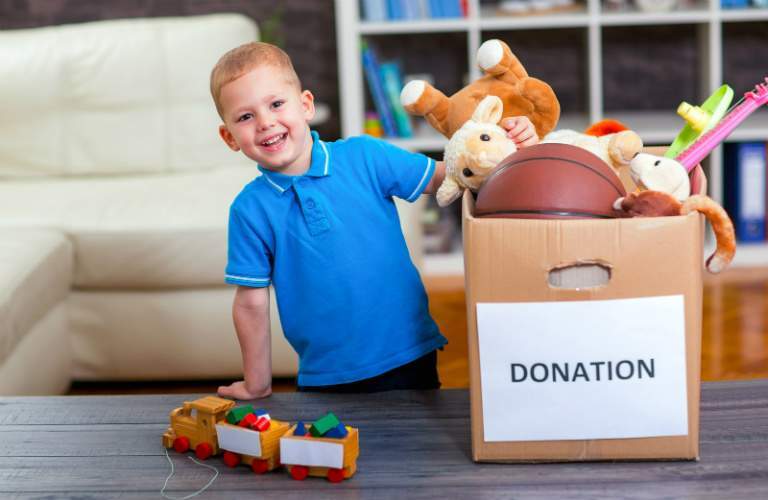 kid playing with donated toys