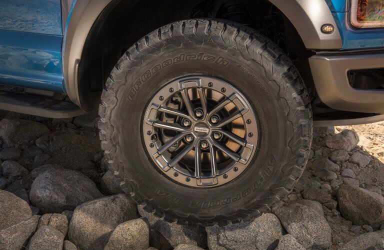 Closeup image of 2019 Ford F-150 Raptor tire to illustrate off-road capabilitiy