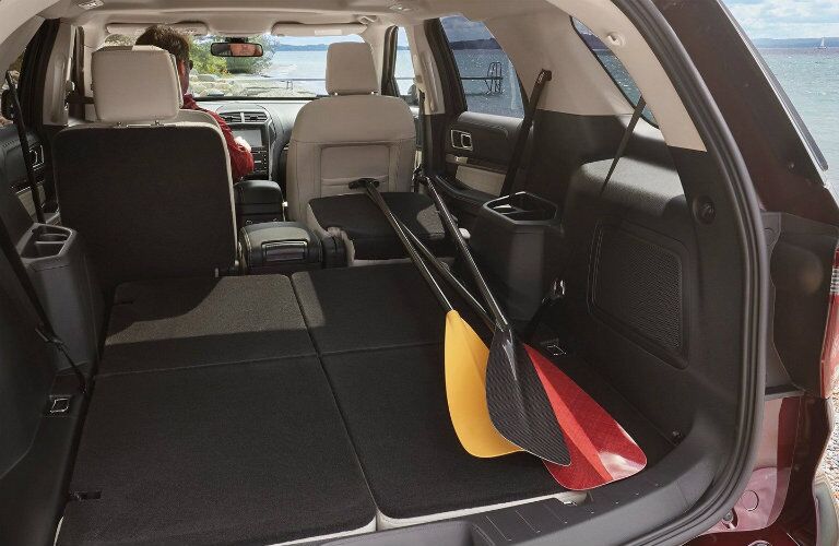 Paddles in rear cargo area of 2019 Ford Explorer