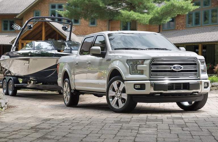 Silver 2016 Ford F-150 Towing a Boat