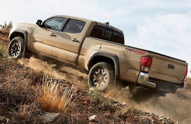 Rear-three quarter view of the 2017 Toyota Tacoma off-roading