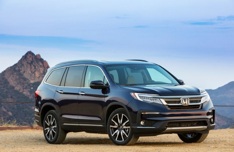 2021 Honda Pilot near a mountain ridge