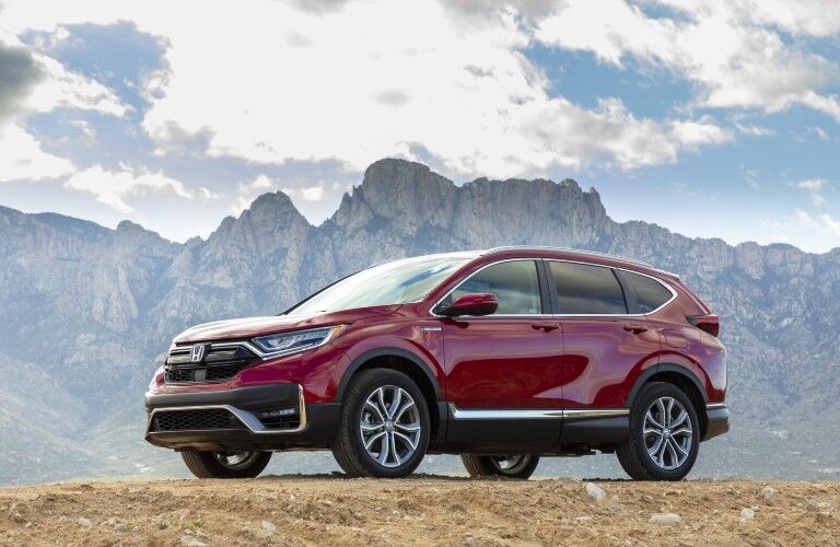 A used Honda CR-V Hybrid parked on a mountain.