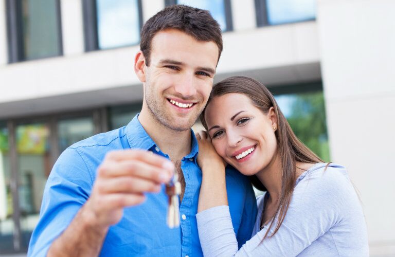 couple with new set of car keys