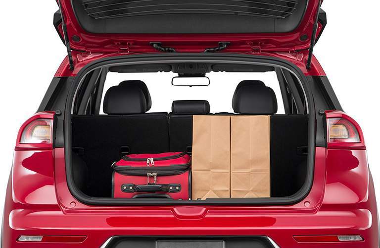 A look in the rear of the 2018 Kia Niro with the rear seats deployed