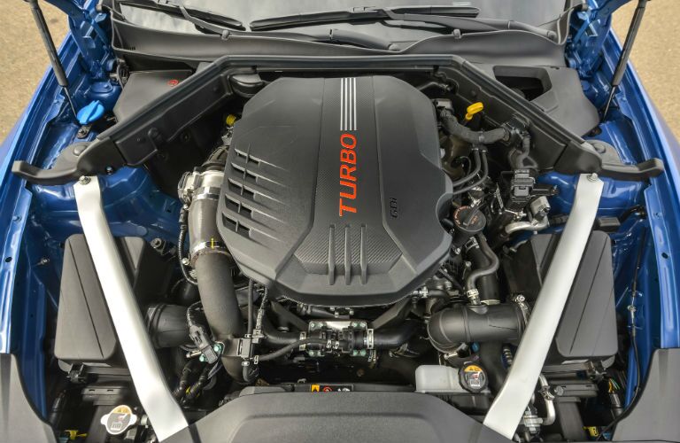 A photo of the engine compartment in the 2018 Kia Stinger.