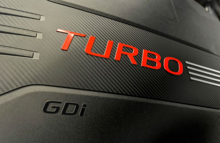 A close up photo of the engine cover used in the 2018 Kia Stinger.