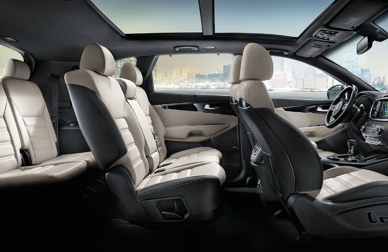 A cut away photo showing the all three rows of seats available inside of the 2018 Kia Sorento.